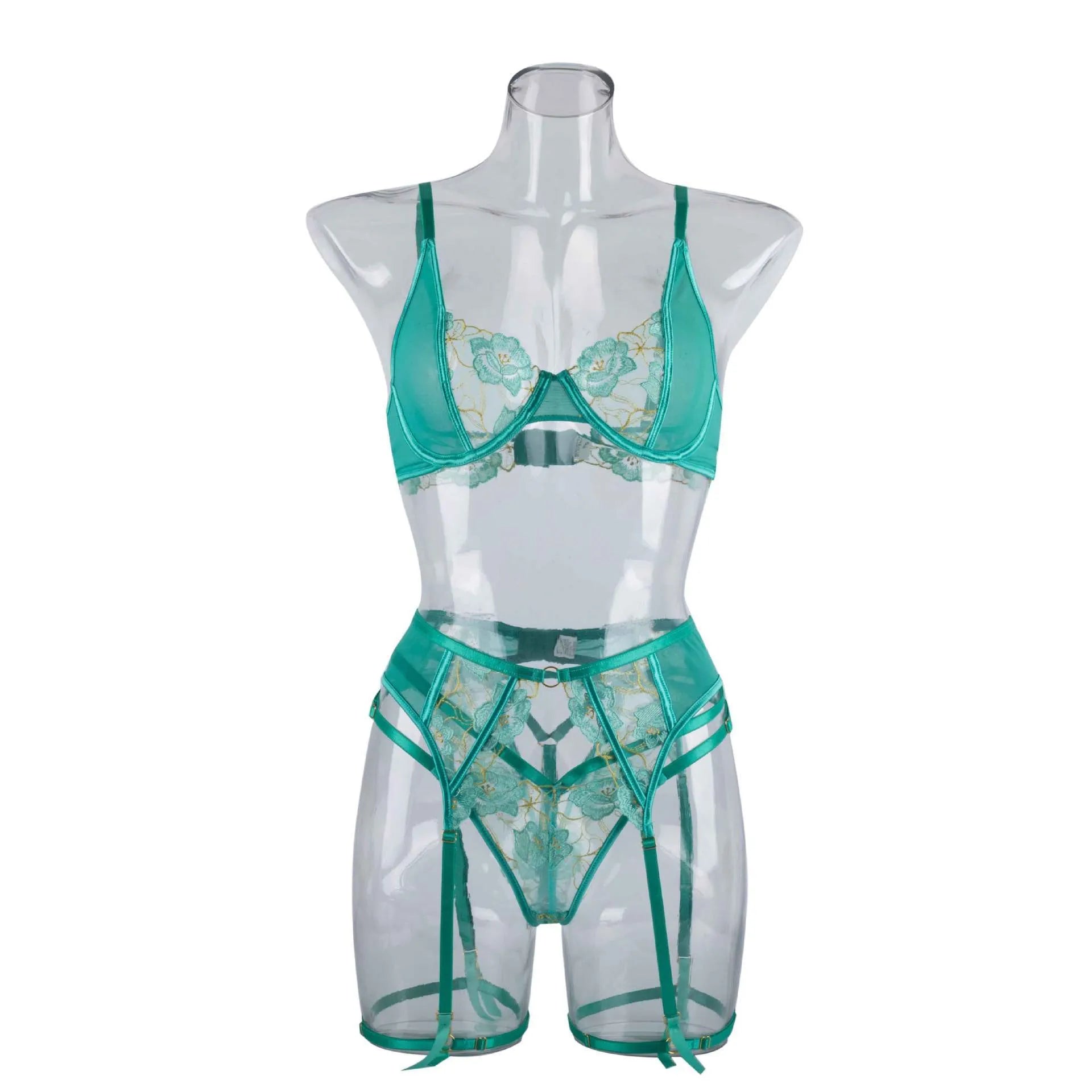 Light green women's embroidered bra set with three-point style and tights on a mannequin.