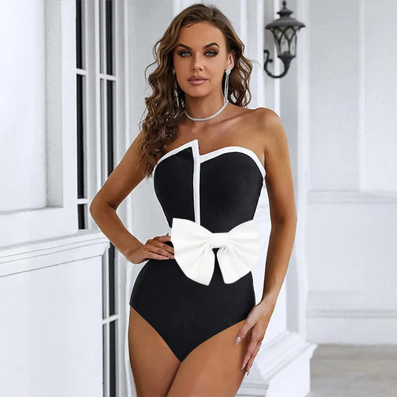Black and white colour-block women's swimsuit with bow detail and irregular tube top