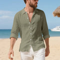 Linen casual shirt in a loose American fit on a hanger, shown in an earthy yellow colour.