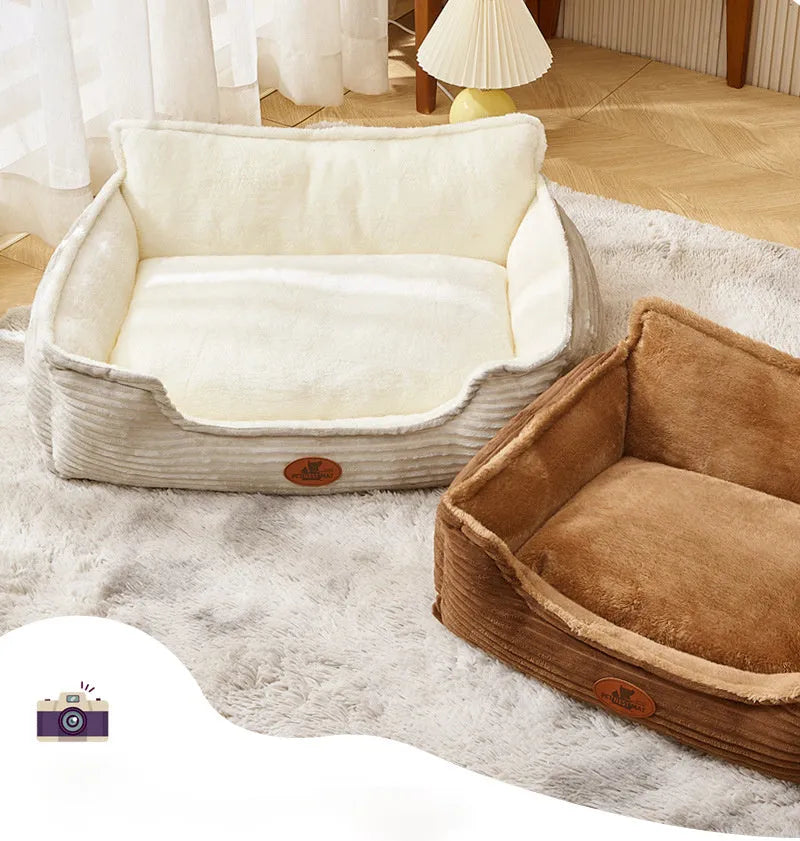 Coffee and white coloured removable washable dog kennel bed shown in small and medium sizes on a sofa and floor.