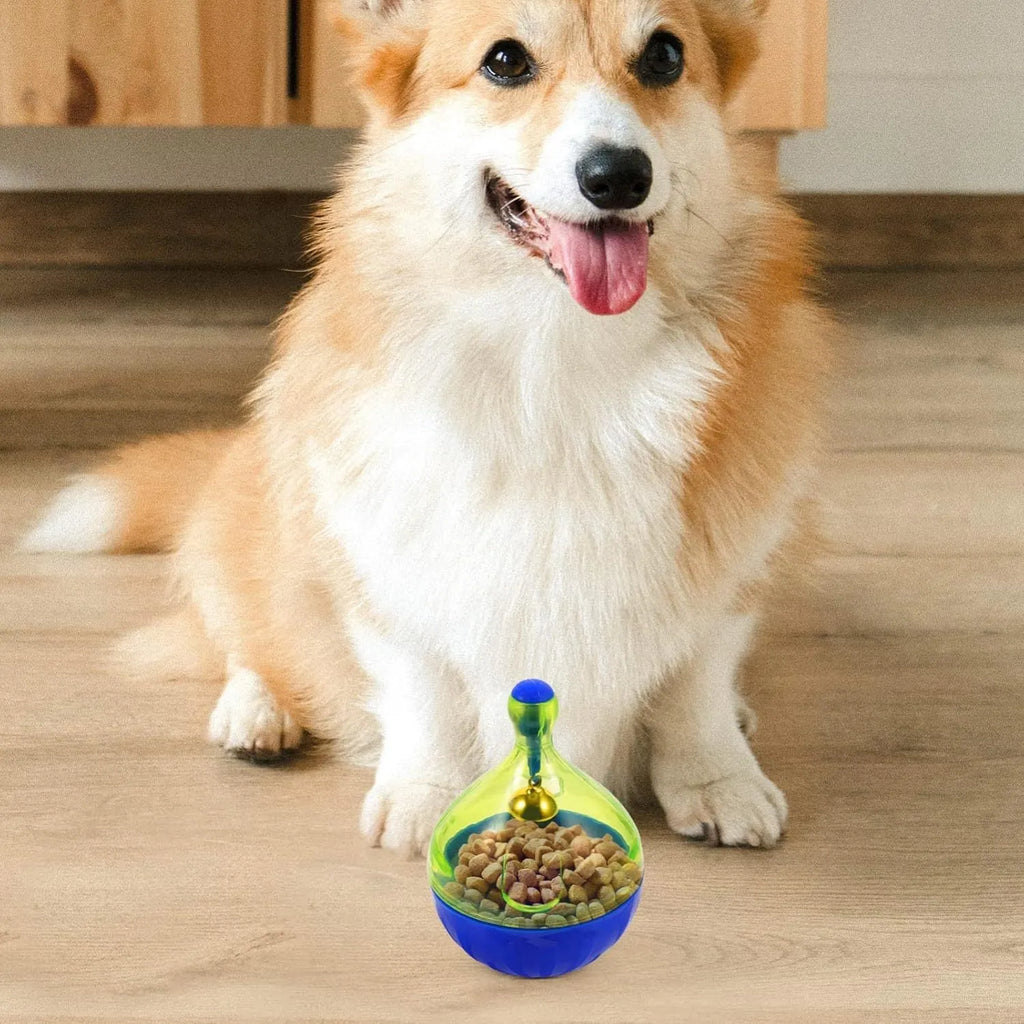 Tumbler-shaped pet treat dispenser toy for dogs and cats with leaky food openings