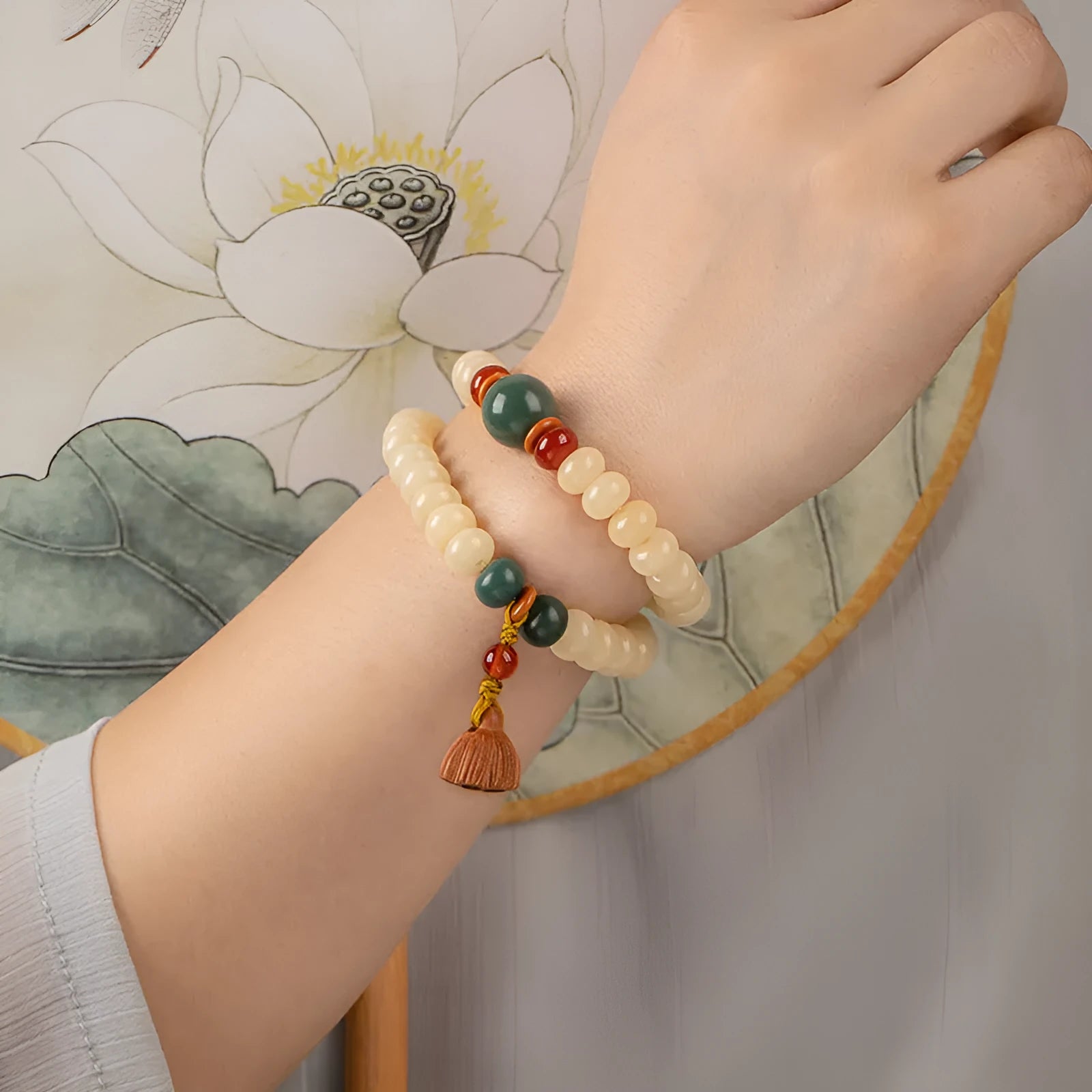 Wooden bracelet with flat round cream topaz beads for a 15-20cm wrist.