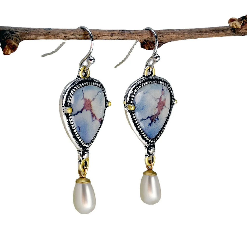 Retro blue geometric drop earrings with synthetic opal and pearl details on electroplated metal