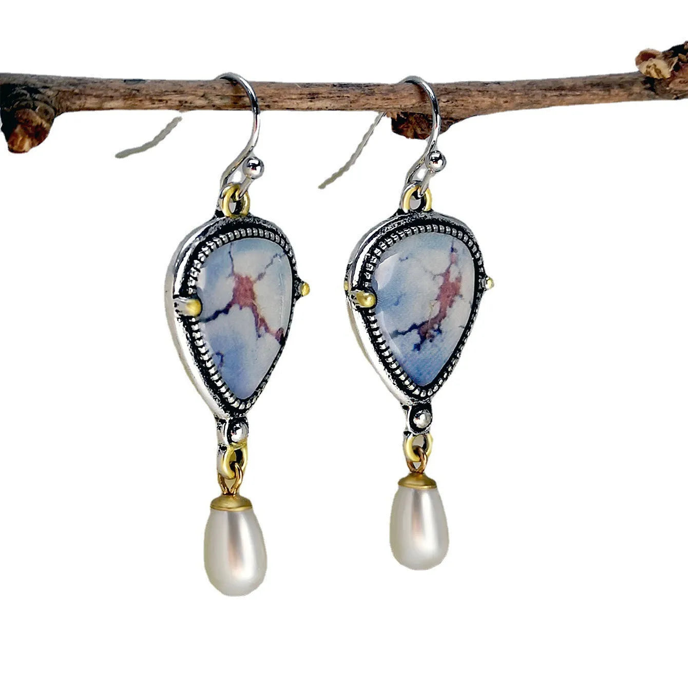 Retro blue geometric drop earrings with synthetic opal and pearl details on electroplated metal