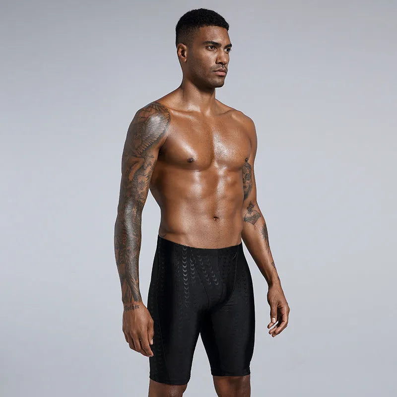 Men's solid colour waterproof polyester swimming trunks for beach and surf, shown in larger sizes.