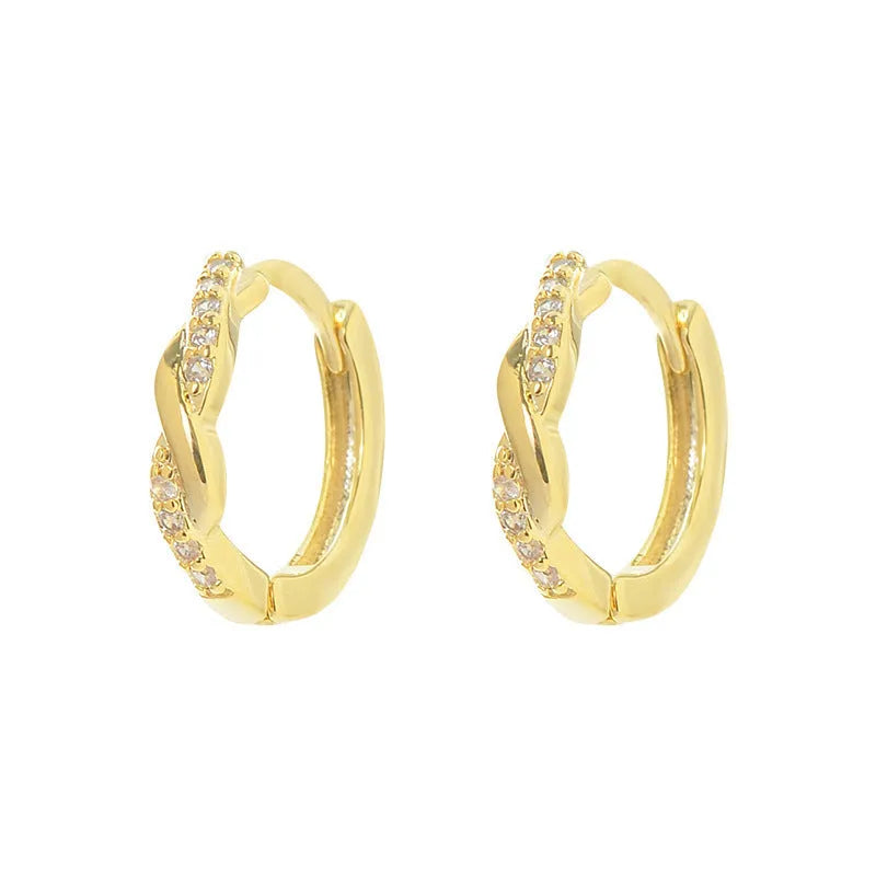Geometric interwoven hemp rope earclip earrings in gold or silver colour on a copper base.