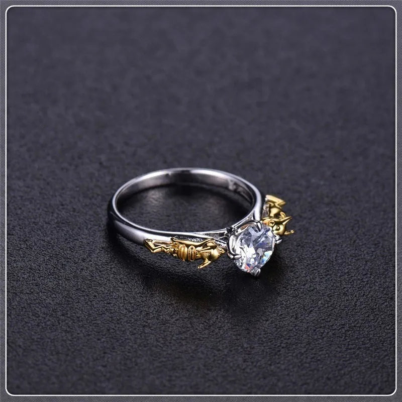 A black gold finished copper ring in a crown shape for cosplay and festivals.