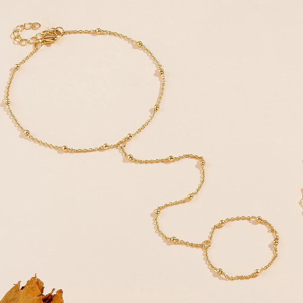Gold electroplated alloy mitten-type round bead bracelet for women with geometry shape and simple style