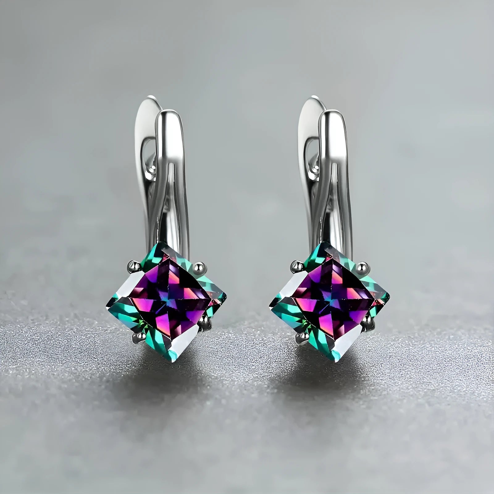 Women's copper earrings with inlaid zircon diamond design in blue, green, and colour options.