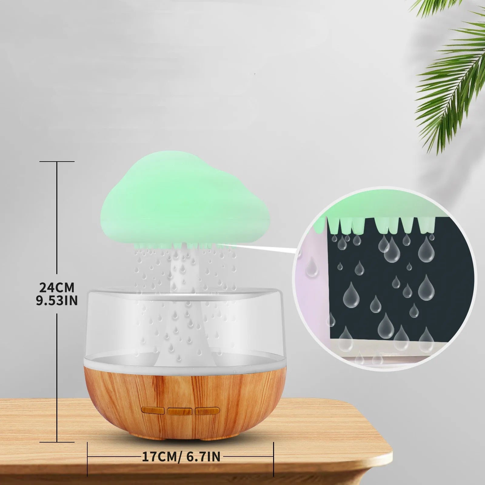 White cloud-shaped humidifier with multi-colour night light and essential oil diffuser on a table.