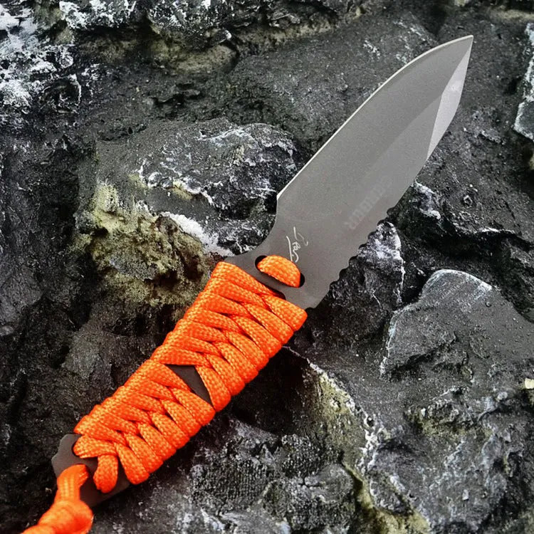 Camping knife with straight blade and rope bound handle showing ABS sheath