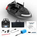 Black GPS remote control fishing boat on water with handheld transmitter, showing LED light.