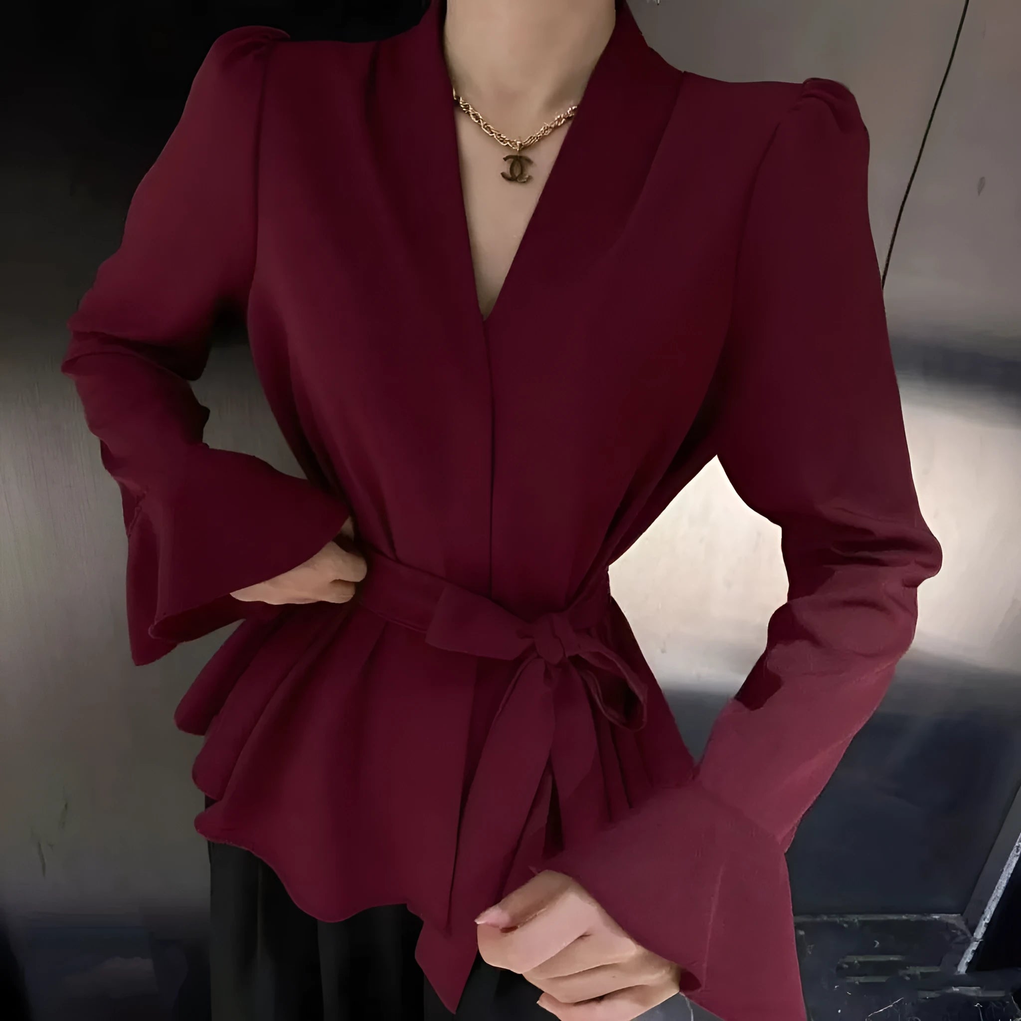 Women's French-style long sleeve tied shirt with irregular collar and bell sleeves in polyester fabric