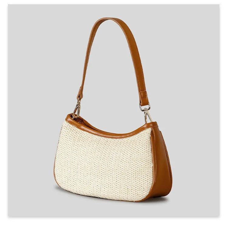 Khaki coloured hand-woven straw crossbody bag with a single strap and an internal phone pocket.