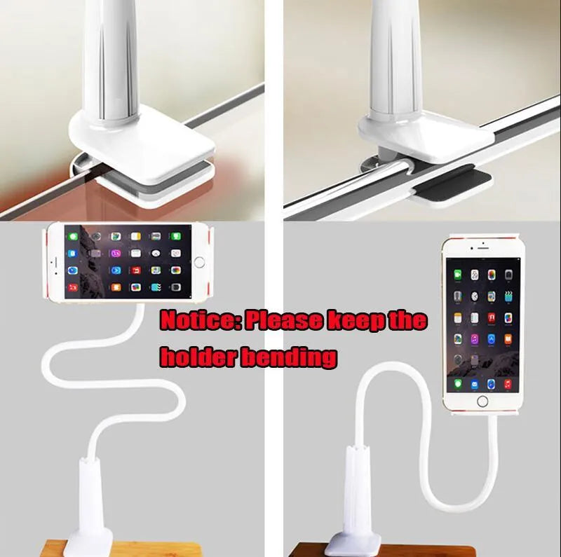 Black bedside phone handset with a long aluminium arm holding a mobile phone on a table.