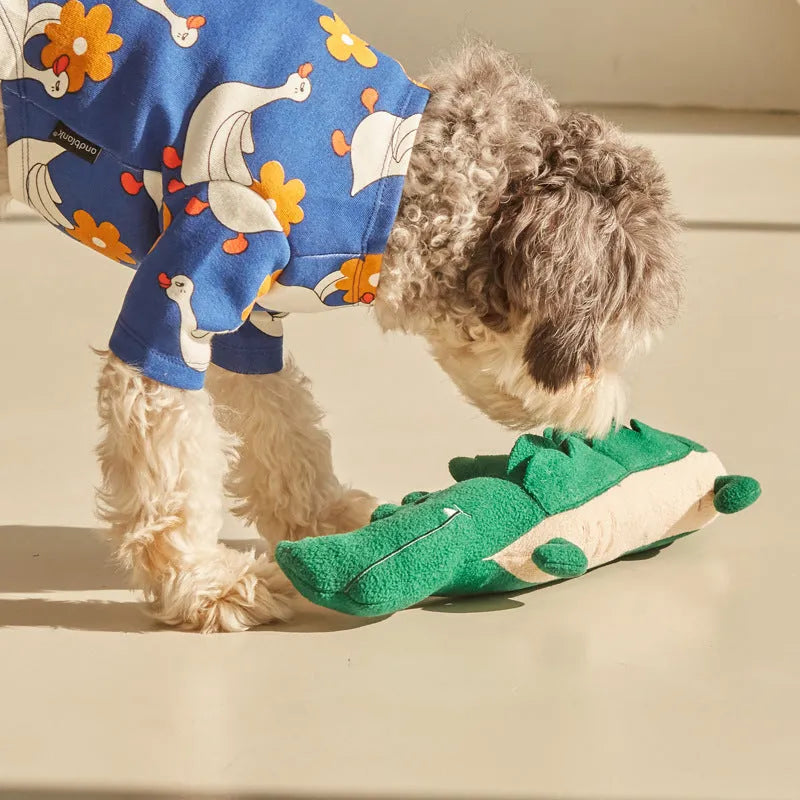 Green plush toy dog soft stuffed animal measuring 35cm by 18cm.
