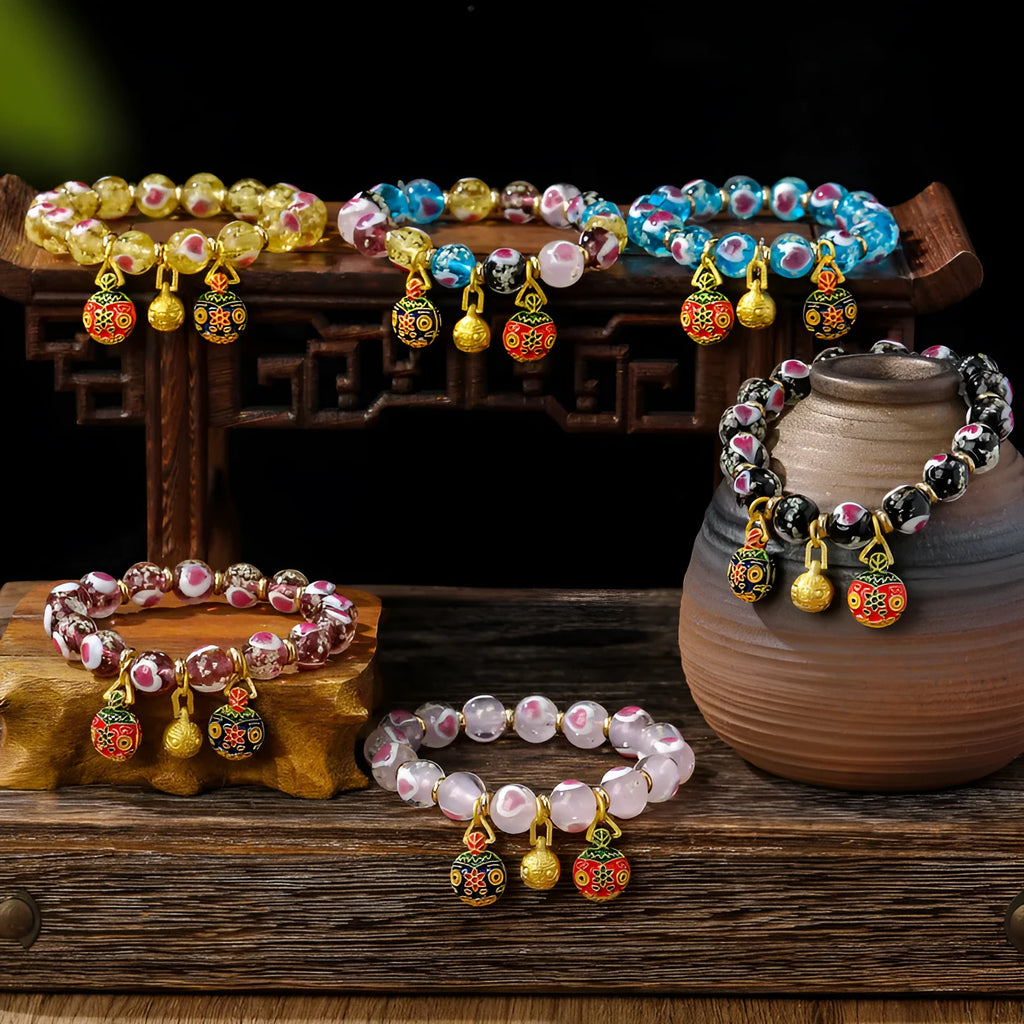 Handmade fluorescent glaze bracelet with swallowing gold beast motif on heart-shaped 10mm beads