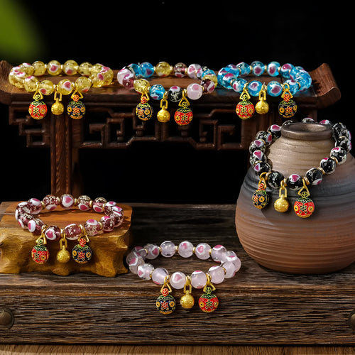 Handmade fluorescent glaze bracelet with swallowing gold beast motif on heart-shaped 10mm beads