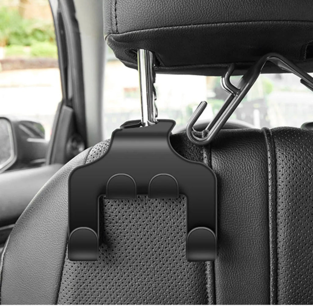 A white ABS plastic car multifunction hook shown as a phone holder and hanging hook.