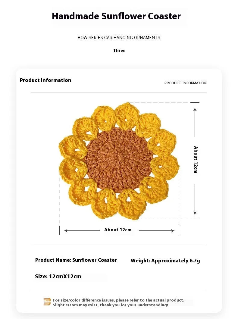 Hand-woven wool coaster with floral pattern on a wooden table.