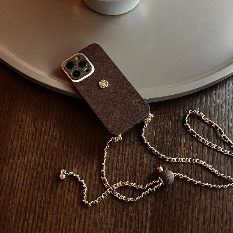 Maillard classic camellia phone case in brown with embossed pattern and adjustable crossbody strap