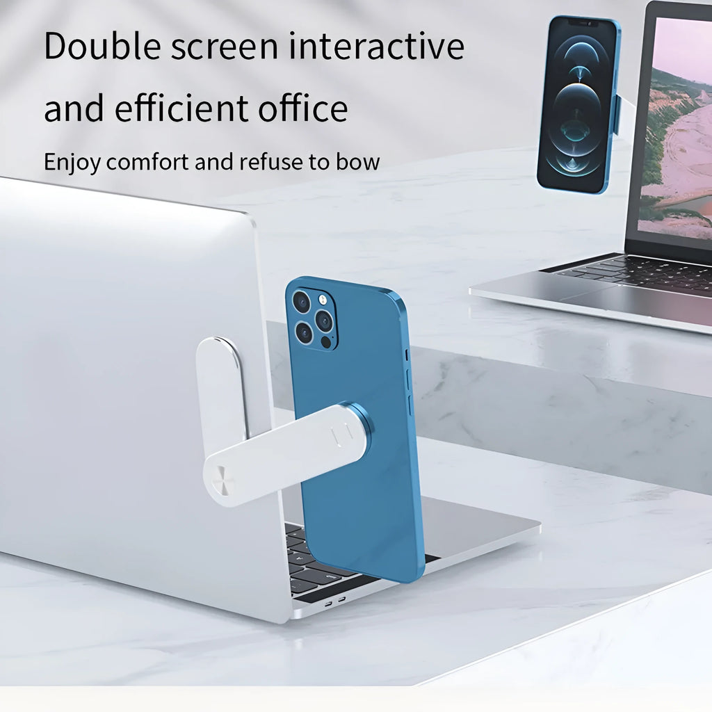 Black aluminium magnetic phone holder clipped to the side of a laptop screen with a smartphone attached.