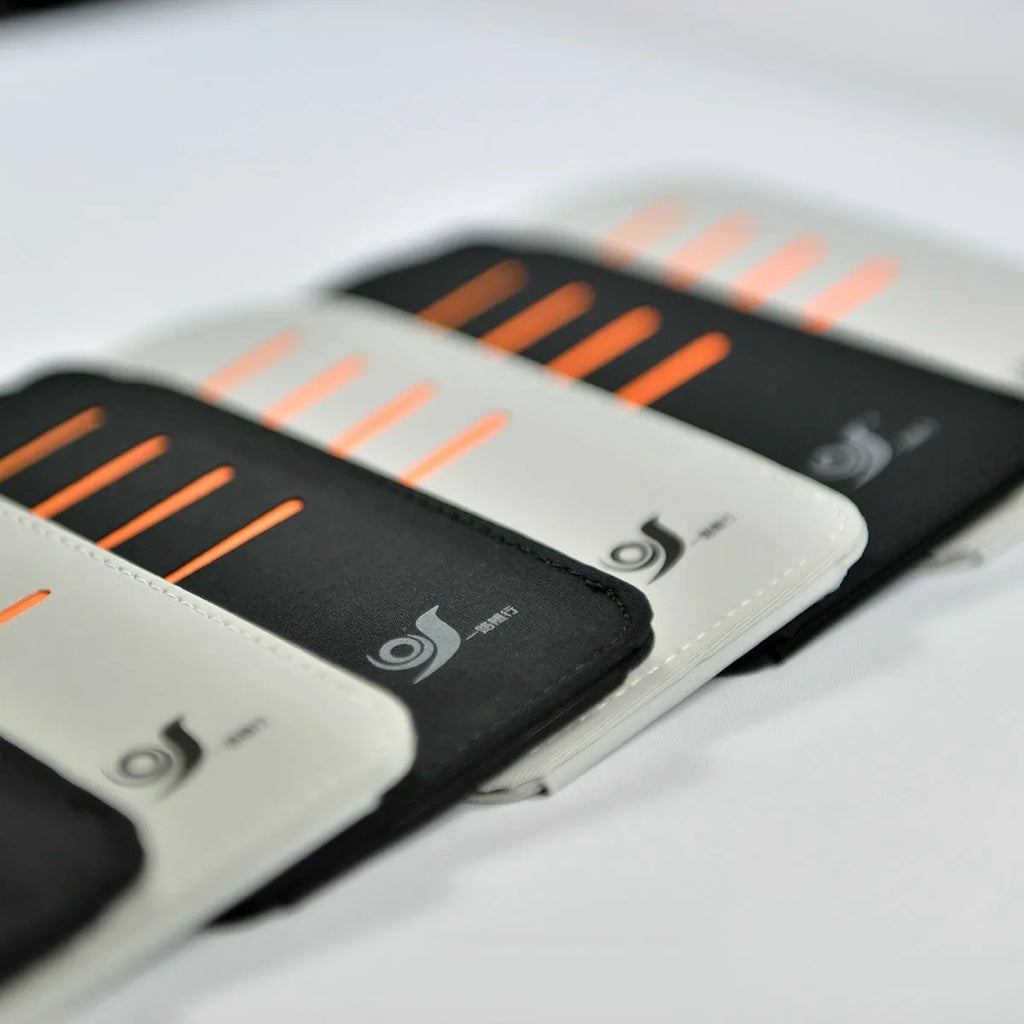 Set of four grey car window shading panels stored in a black vehicle-mounted bag.