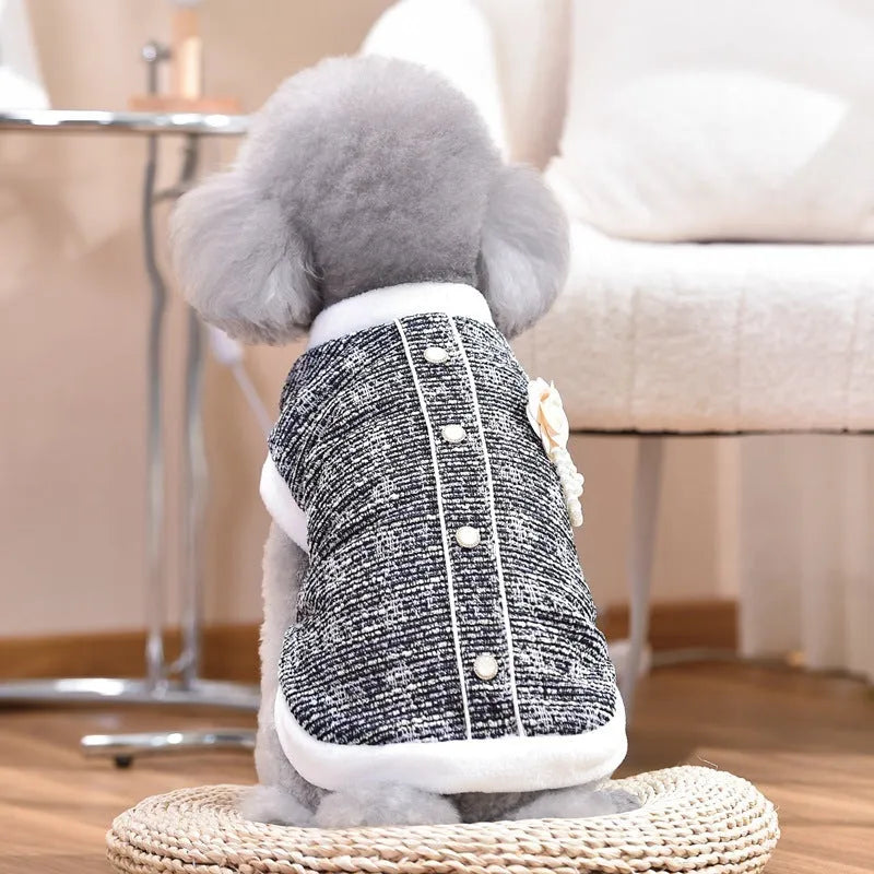 Black sausage jacket costume for cat on mannequin showing PU material and size tag