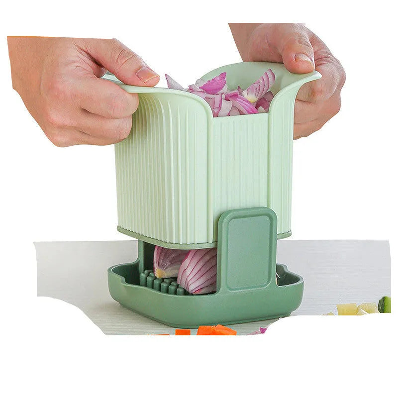 Green multi-functional vegetable chopper with stainless steel blades for French fries and onion dicing