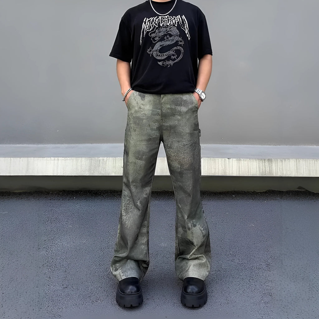 Men's straight-cut camouflage print denim jeans on a white background.