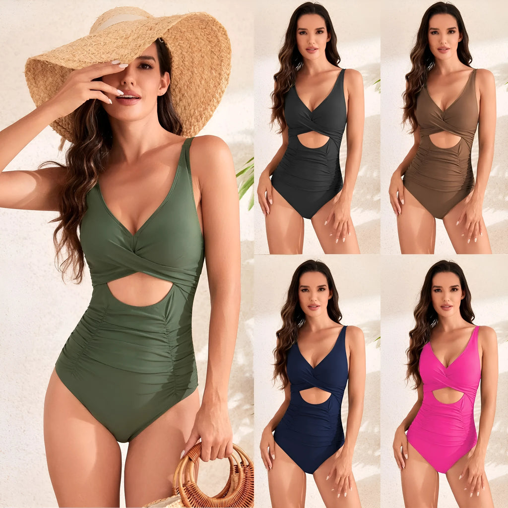 Women's black high-waist one-piece swimsuit with cross-back straps and pleated front detail.