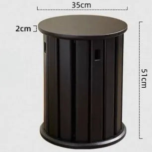 Stackable iron dining stool with large round seat in smoked black finish.