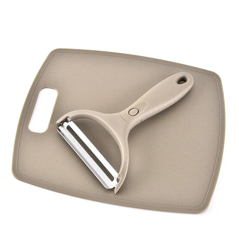 Brown eight-piece kitchen tool set with stainless steel cutter, peeler, fruit knife and wheat straw chopping board