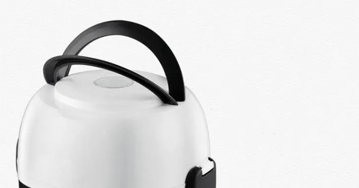 White rice cooker with 2L capacity and steaming basket options