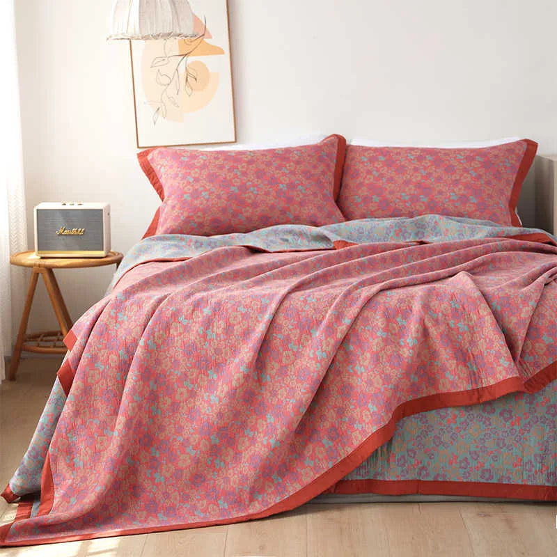 Cotton gauze three-piece bedding set with floral pattern including blanket and two pillowcases