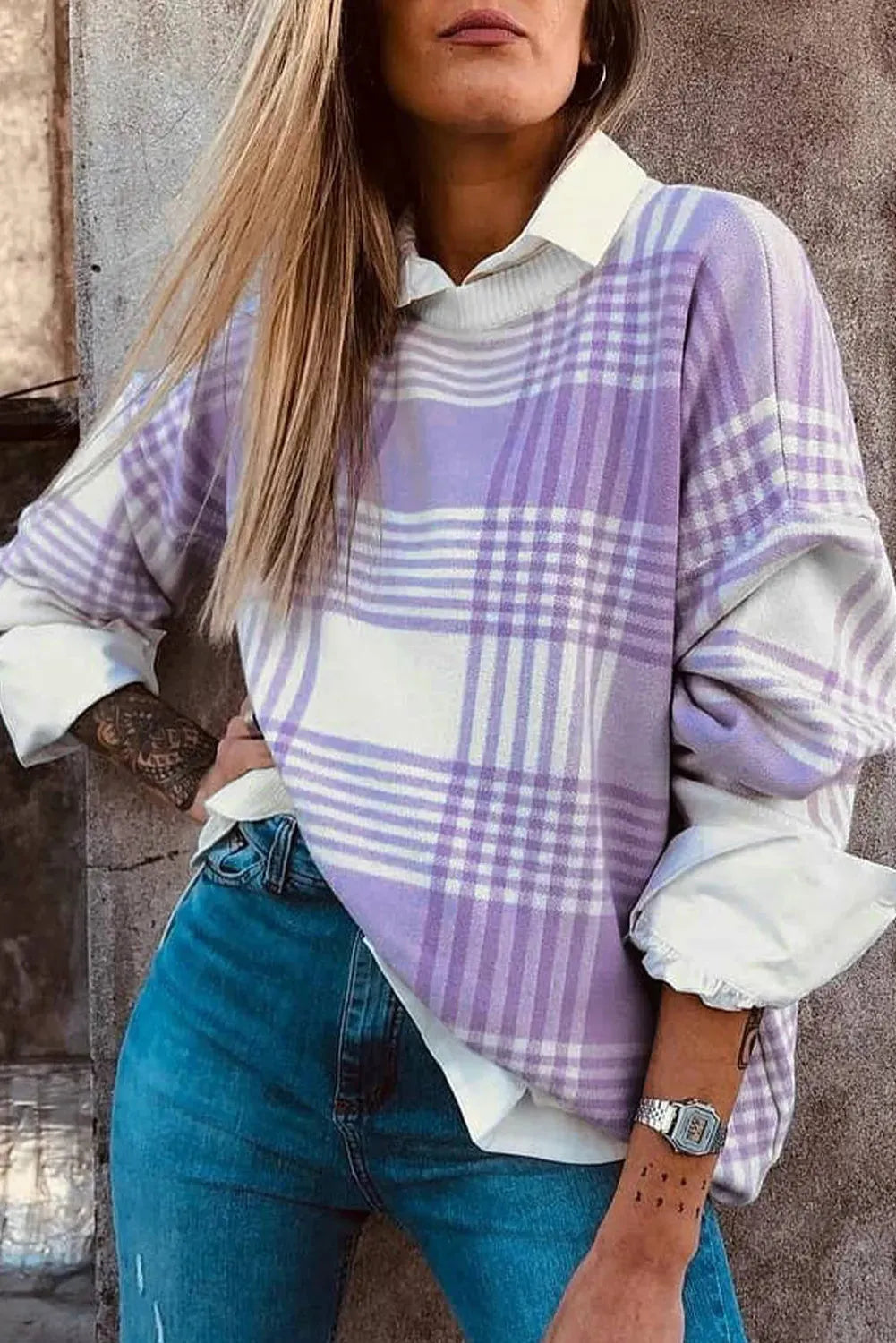 Lilac plaid print loose long-sleeved sweater with ribbed trim on cuffs and hem.