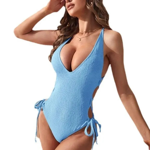Women's black hollow backless one-piece tether bikini swimsuit made from polyester fabric