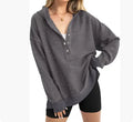 Women's loose raglan sleeve sweater in peacock green, a casual polyester pullover for autumn and winter.