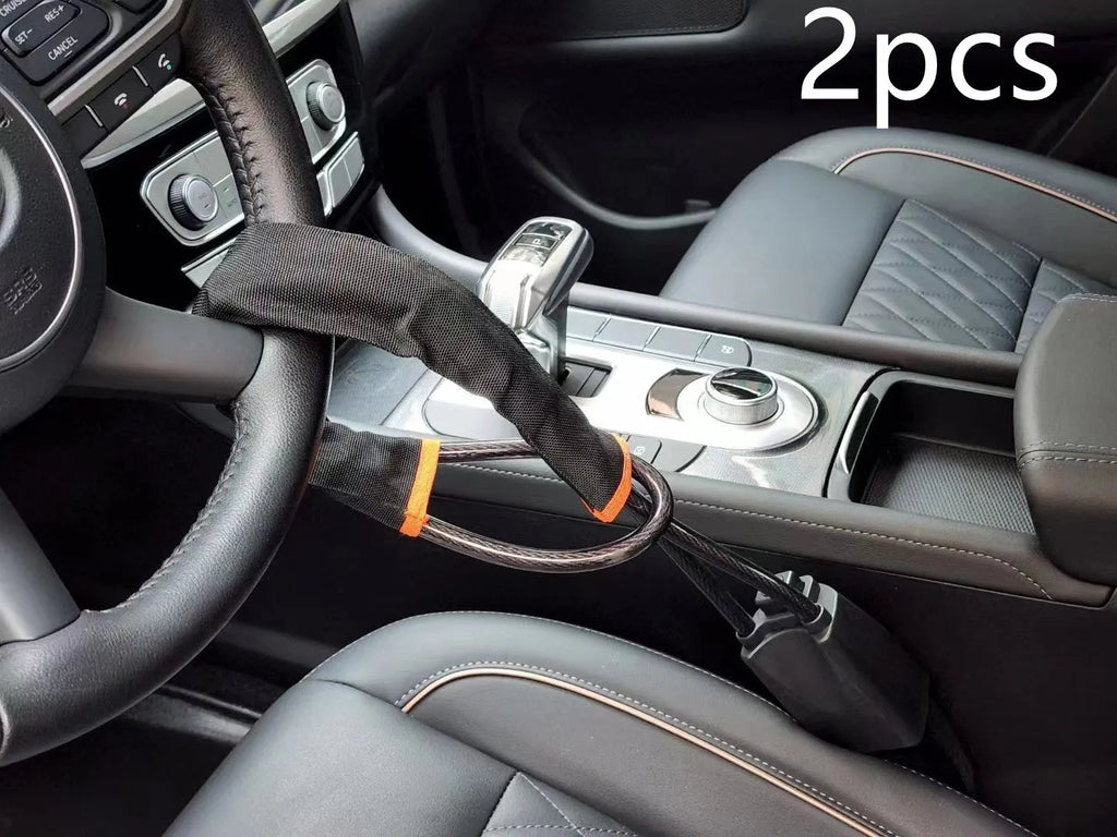 Red iron steering wheel lock for General Motors cars showing copper lock core