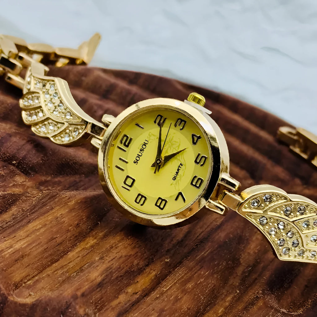 Women's stainless steel watch with gold face round dial and vachette clasp buckle