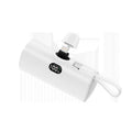 Compact capsule-shaped wireless power bank with digital display and integrated plug in multiple colours.