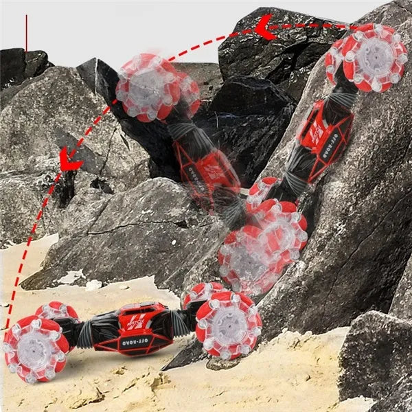 4WD RC stunt car in red with gesture remote control, morphing off-road design, plastic construction