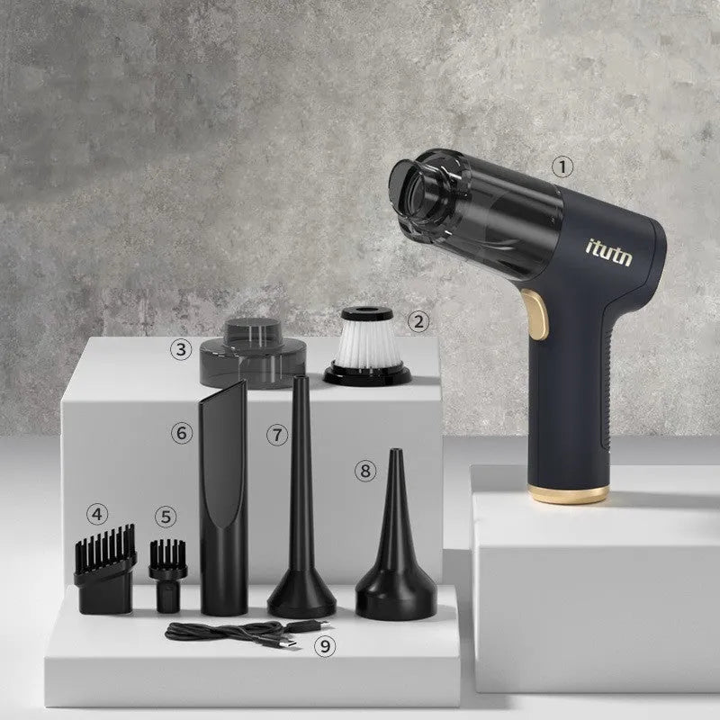 Black wireless handheld vacuum cleaner with attachments for car and home use.
