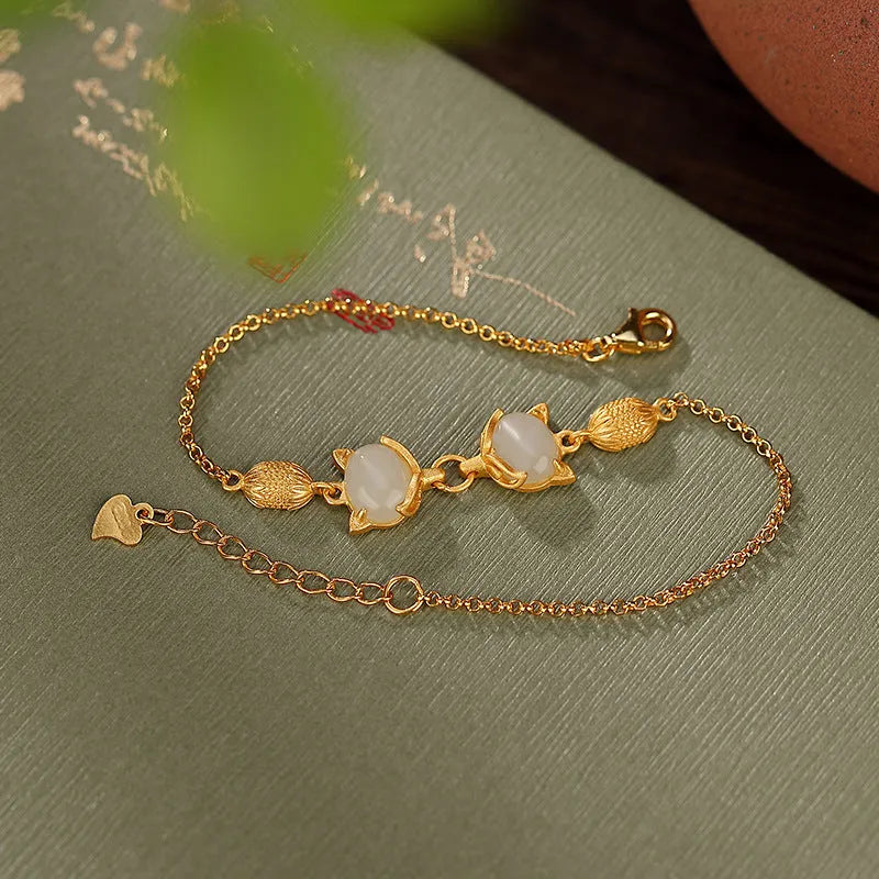 Women's silver bracelet with fox charm pendant in jade or jasper colour options