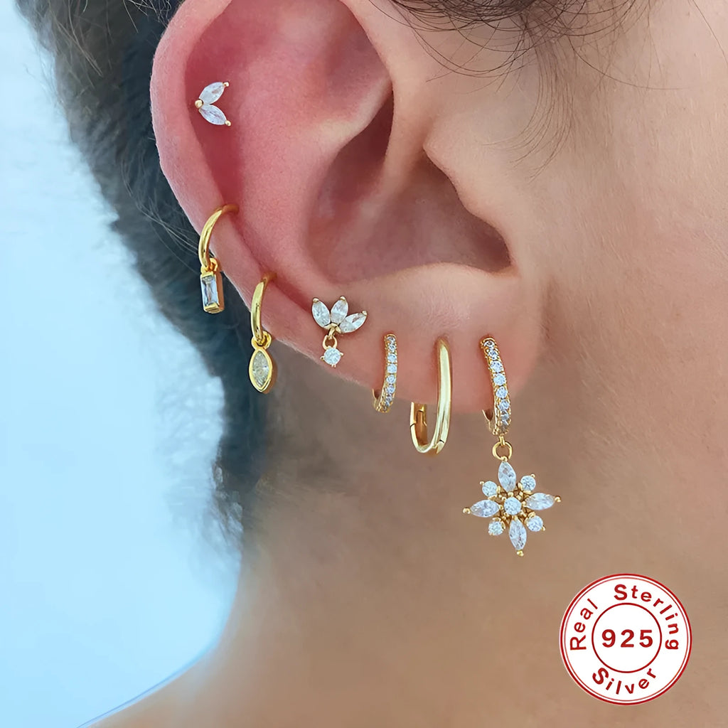 Sterling silver geometric snowflake earrings with diamond accents in yellow or white gold colour