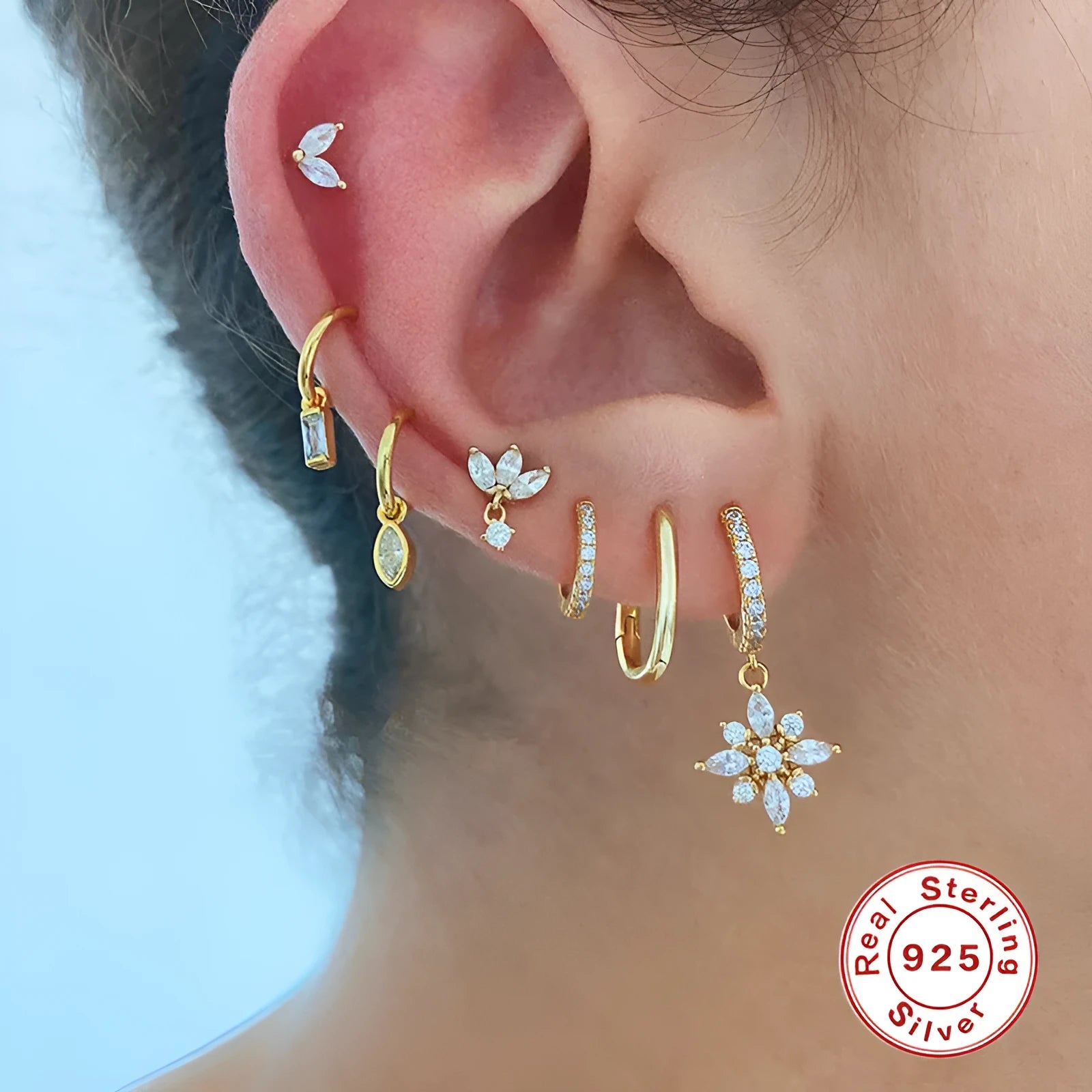 Sterling silver geometric snowflake earrings with diamond accents in yellow or white gold colour
