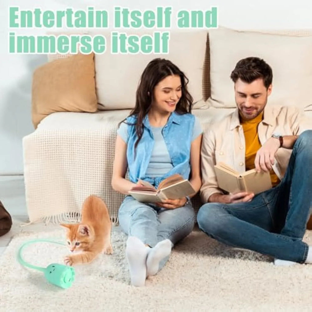 Green automatic electronic cat wand toy with swinging silicone tails on a 38cm wand.