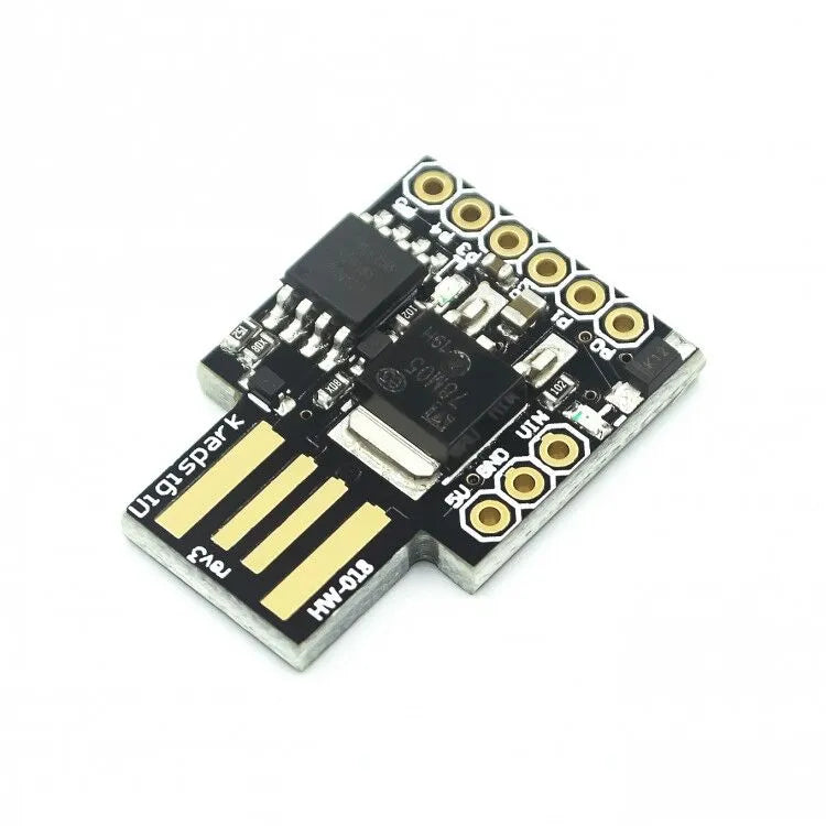 Micro USB development board black with USB port, 6 I/O pins, and onboard LEDs