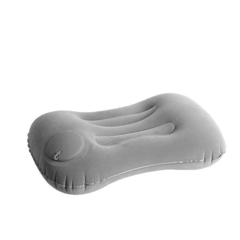 Gray inflatable travel pillow showing press valve, dimensions 45cm by 30cm.