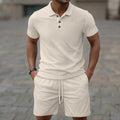 Men's solid colour jacquard short sleeve casual suit with matching shorts on a hanger.
